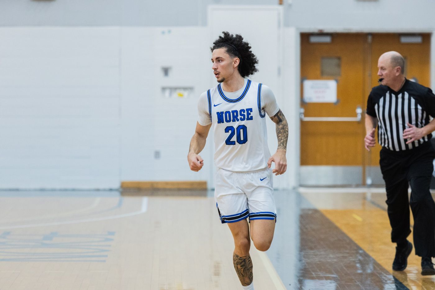 Kyanu running the floor in a Luther home game